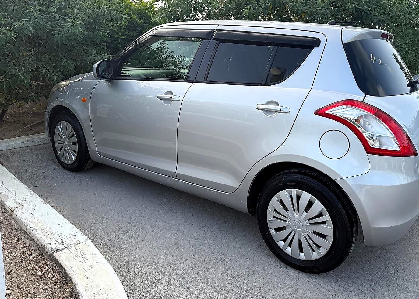Economy — Suzuki Swift — silver
